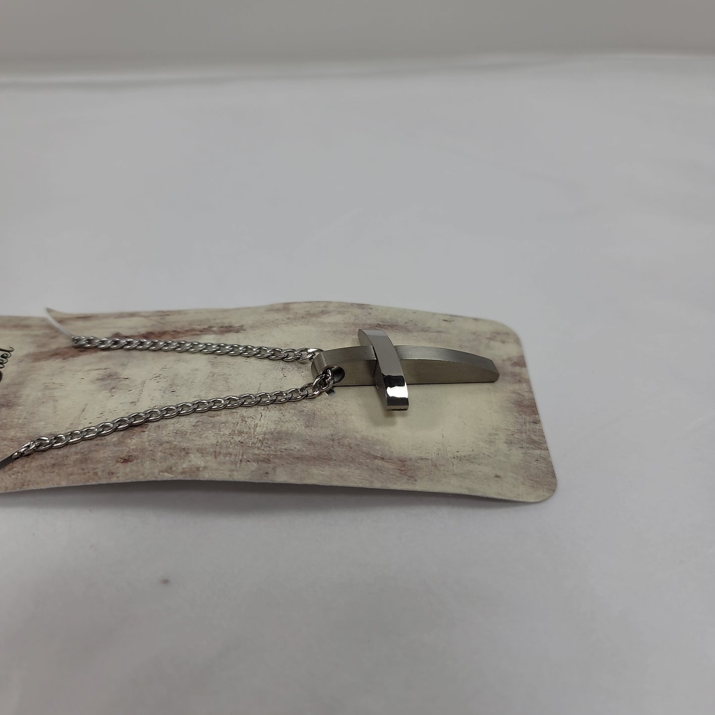 MENS SS CURVE CROSS NECKLACE-4410 : 24 IN